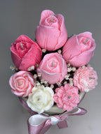 Side view of Wickory Blossom Bud handcrafted beeswax flower candles showing layered petal detail and braided cotton wicks in a petite bouquet format