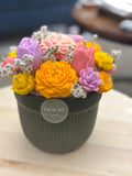 Wickory Blossom Garden lush handcrafted beeswax floral candle arrangement featuring a full mix of large and small hand-poured blooms in yellow, styled as a statement gift bouquet
