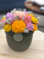 Wickory Blossom Garden lush handcrafted beeswax floral candle arrangement featuring a full mix of large and small hand-poured blooms in yellow, styled as a statement gift bouquet
