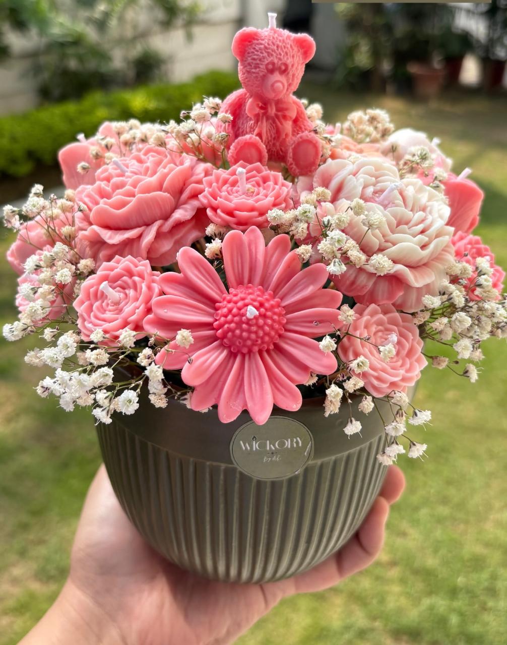 Wickory Blossom Bear Bouquet — a handcrafted beeswax floral bouquet featuring twenty individually hand-poured flower candles arranged around a sculpted bear, ideal as a luxury gift