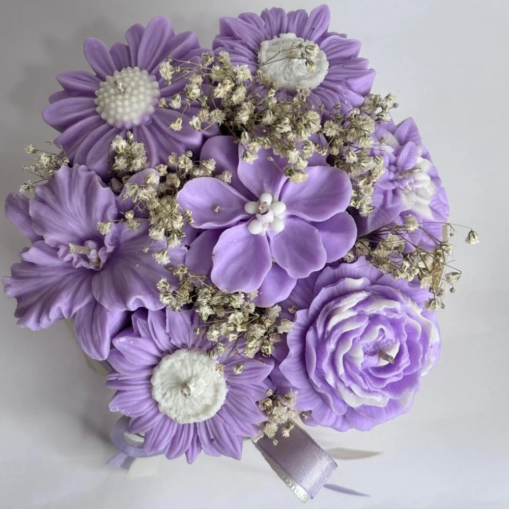 Wickory Blossom Bunch: lavender and purple sculpted beeswax flower candles with small white filler flowers, tied with a lavender ribbon