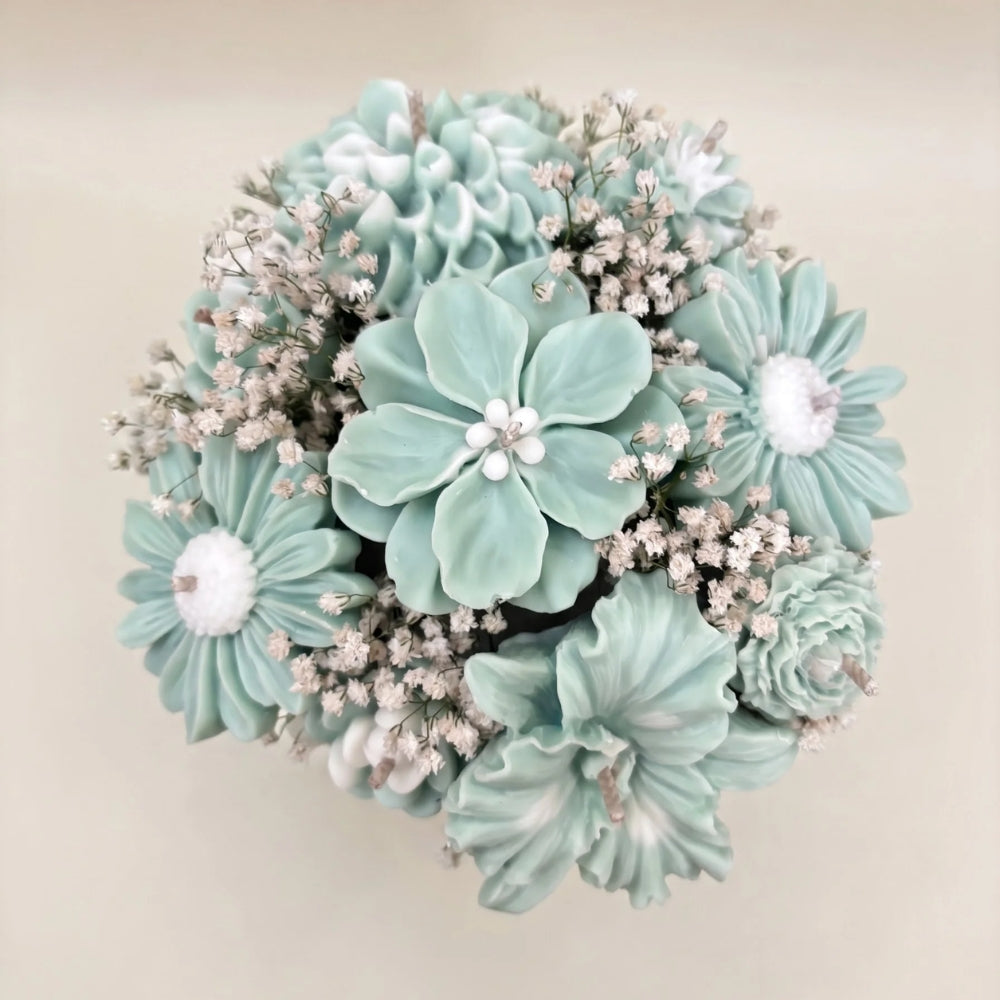Wickory Blossom Bunch: mint green and white sculpted beeswax flowers with white filler flowers, seen from above