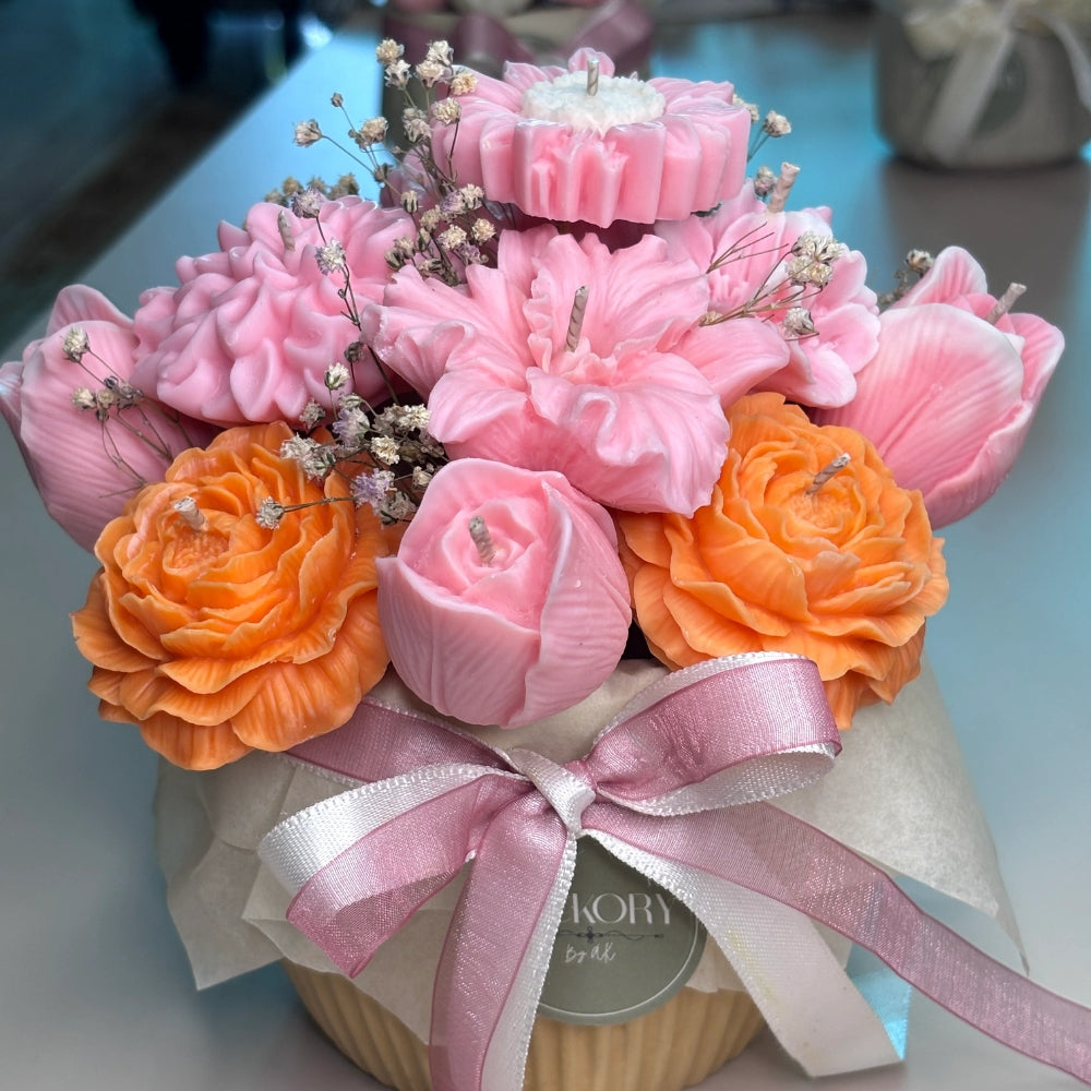The Blossom Garden: pink and orange candle flower bouquet tied with ribbon