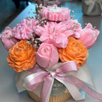 The Blossom Garden: pink and orange candle flower bouquet tied with ribbon