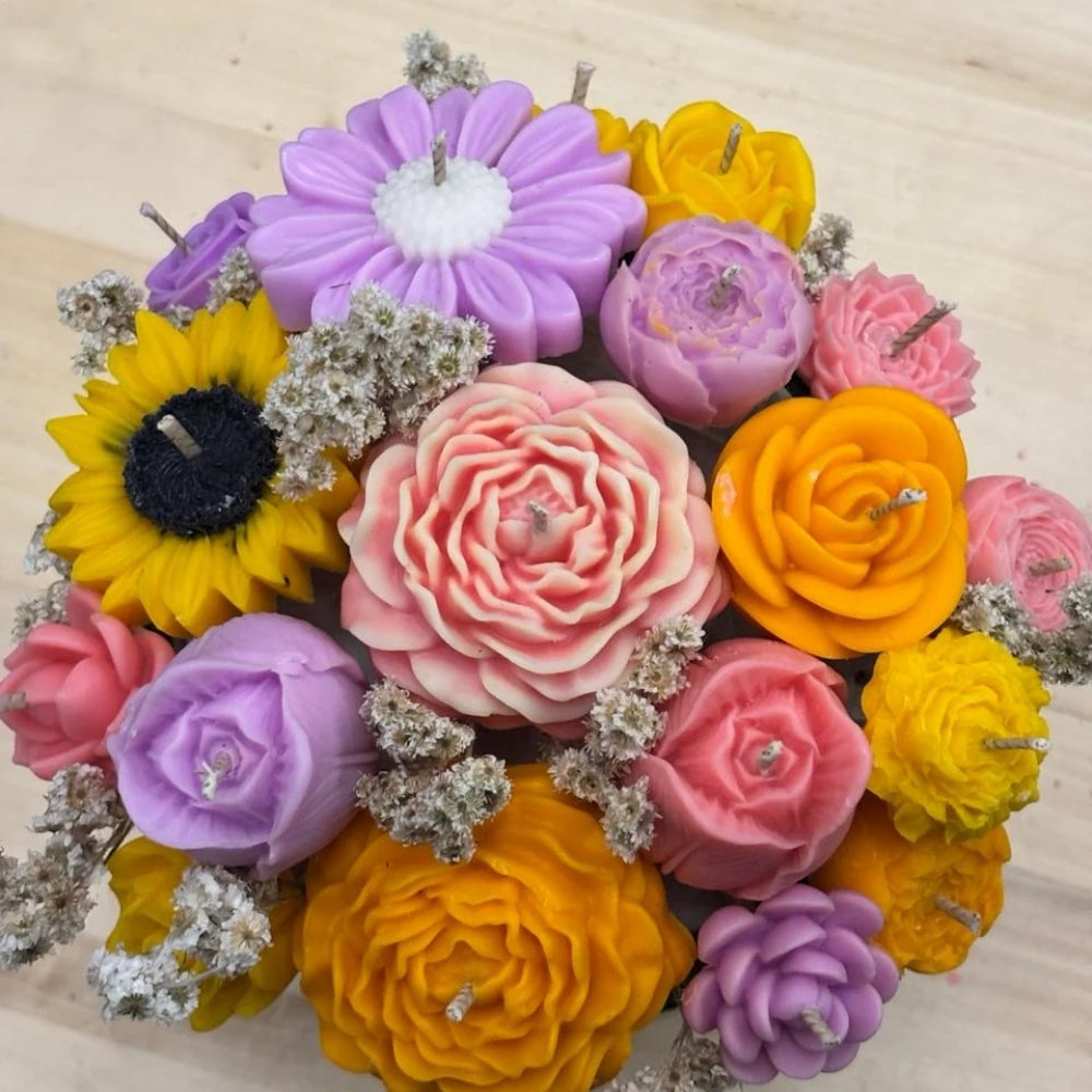 The Blossom Garden in mixed colours: lavender, yellow, pink and orange sculpted blooms with a sunflower