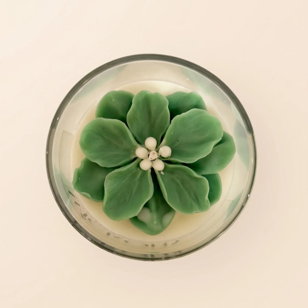 Close-up of The Blush Petal in green: sculpted green petals around a cluster of white centres