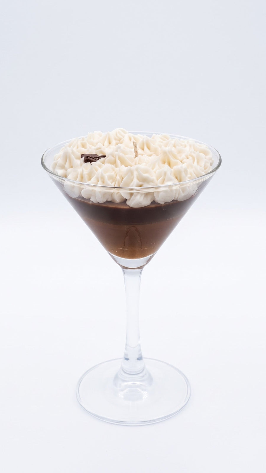 Wickory Espresso Martini beeswax candle, with deep coffee-toned wax, a creamy foam swirl and whole coffee beans set in a martini glass