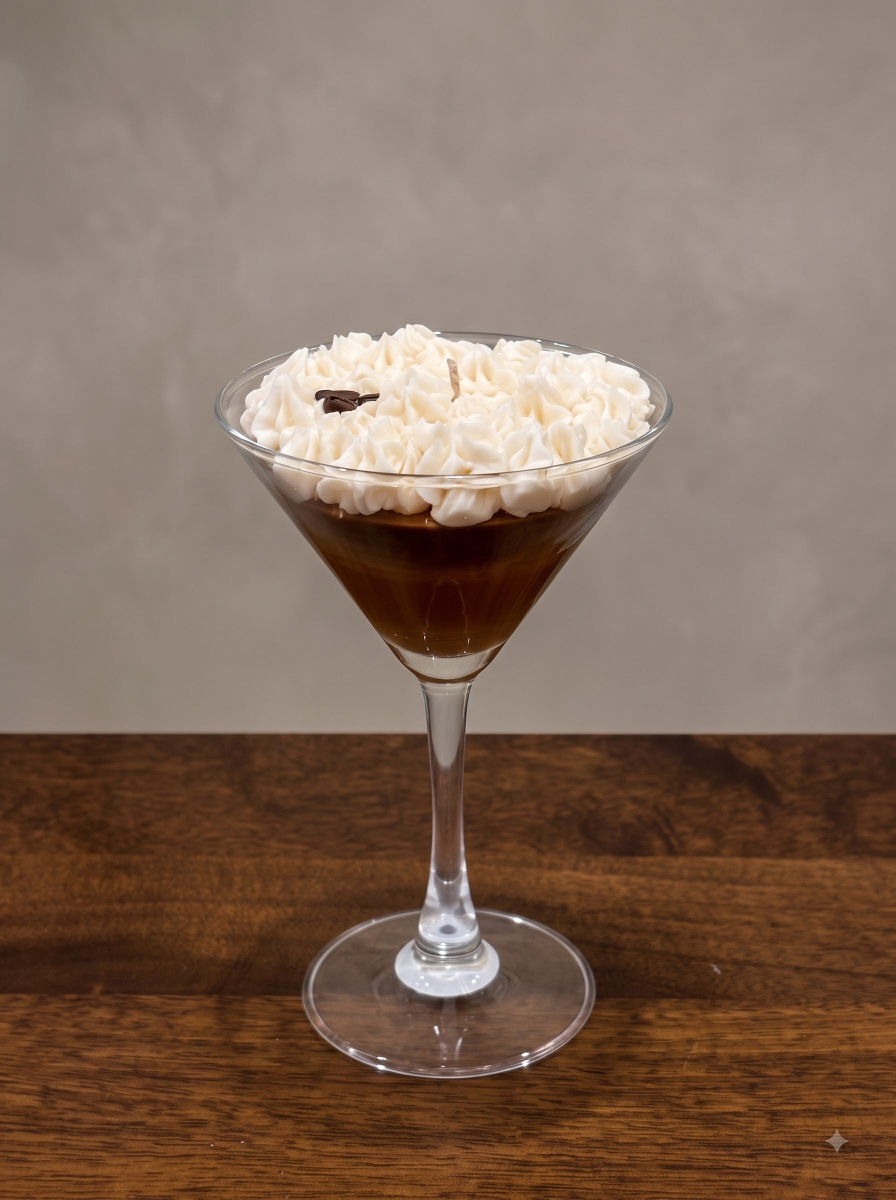 Wickory Espresso Martini beeswax candle, with deep coffee-toned wax, a creamy foam swirl and whole coffee beans set in a martini glass