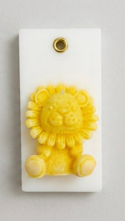 Wickory Little Roar beeswax wax sachet featuring a sculpted lion cub, a newborn and nursery gift