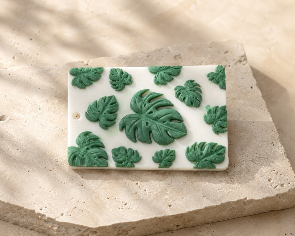 Monstera wax sachet showing the sculpted leaf detail on handcrafted beeswax