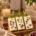 Petal Imprint wax sachets with dried petals, ribbon-tied, on a wooden tray
