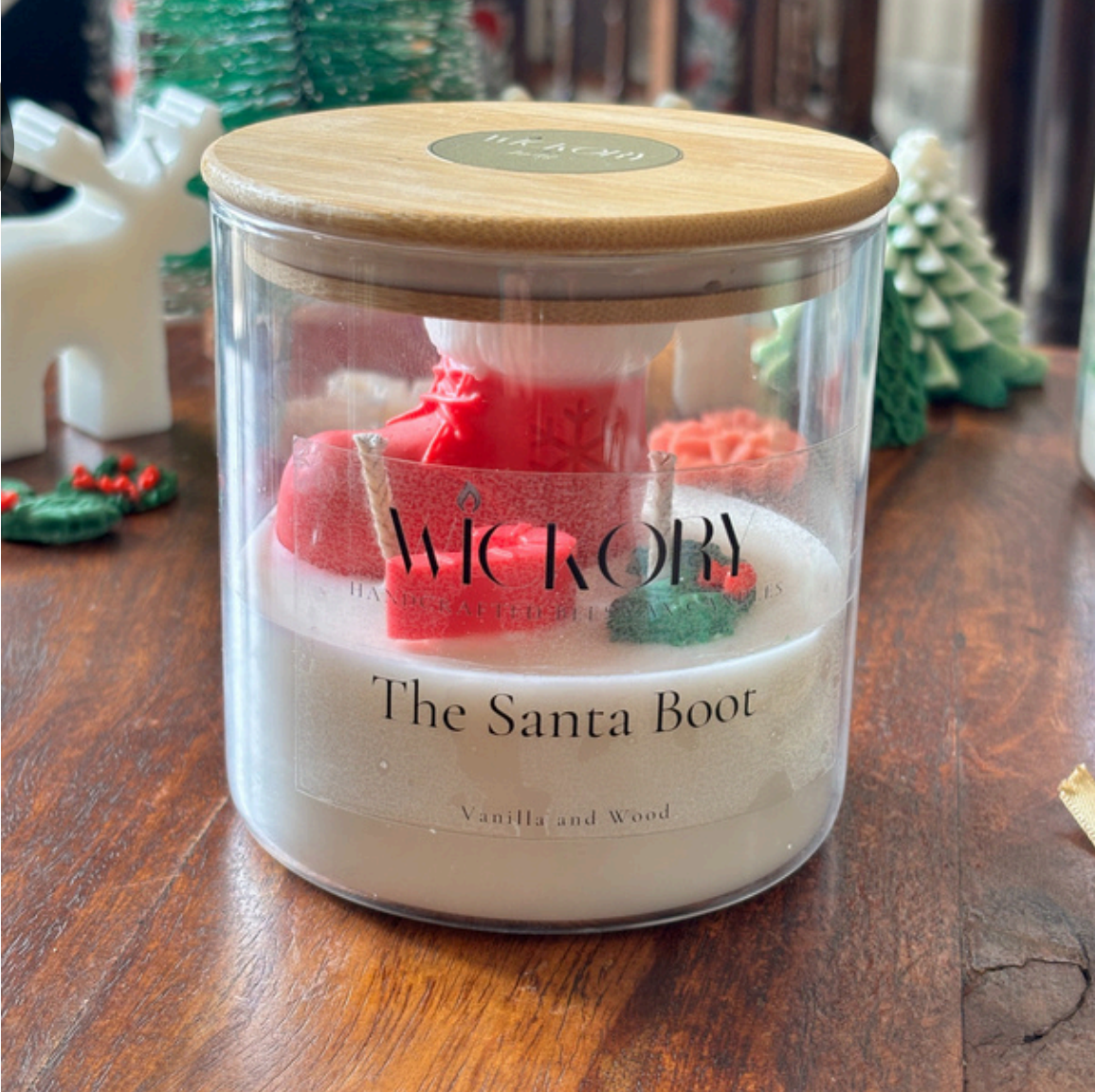 Wickory handcrafted beeswax candle shaped like a festive Santa boot, hand-poured in rich ivory wax with sculpted holiday details, perfect for Christmas gifting in India