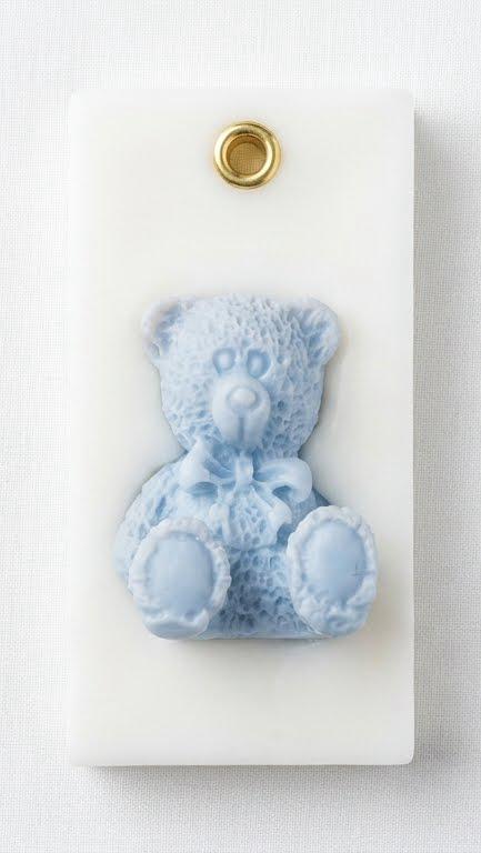Wickory Teddy Treasures beeswax wax sachet featuring a sculpted teddy bear, a baby shower return gift