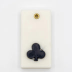 Teen Patti wax sachet with a sculpted black club symbol