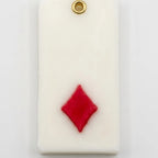 Teen Patti wax sachet with a sculpted red diamond symbol