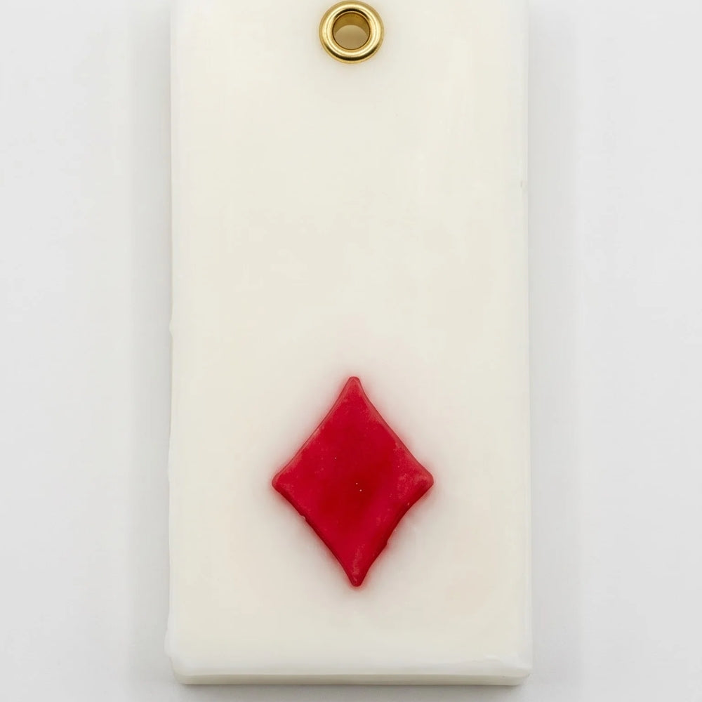 Teen Patti wax sachet with a sculpted red diamond symbol