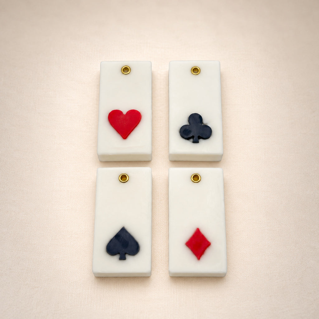 Teen Patti wax sachet set with heart, club, spade and diamond playing card symbols