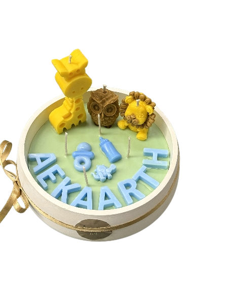Wickory The First Chapter personalised keepsake beeswax candle handcrafted with a baby's name in soft pastel tones, a unique newborn gift and baby shower keepsake