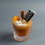 Whiskey Sour candle on a grey background
